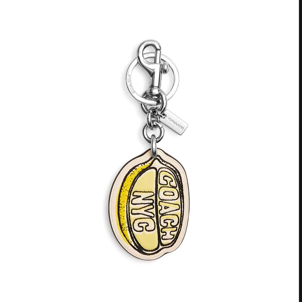 NWT: COACH NYC YELLOW 🍋LEMON🍋 BAG CHARM W/ DUSTBAG